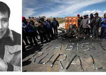 Eliseo Mamani dirigente Pachakuti maestros rurales - Maestros rurales cortando rutas en Apacheta, cerca de La Paz, muestran una moto policial que fue quemada en enfrentamientos.