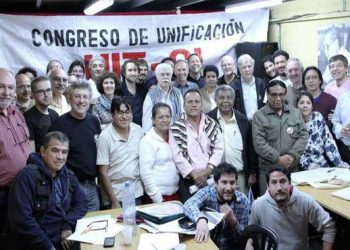 Las delegaciones de los 13 países que estuvieron representados, posan al final del Congreso para celebrar el éxito de la Unificación.