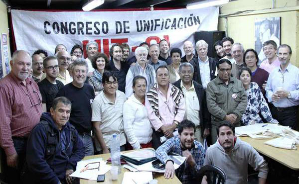 Las delegaciones de los 13 países que estuvieron representados, posan al final del Congreso para celebrar el éxito de la Unificación.