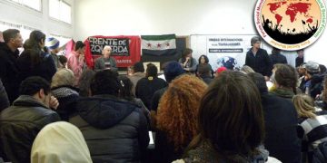 El revolucionario sirio Salamah Kaileh hablando en el taller de la UIT sobre la revolución siria