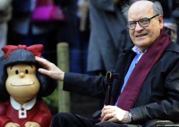 undefined27651563-cartoonist-joaquin-salvador-lavado-aka-quino-poses-beside-200930164704-1601477421181